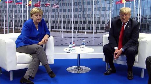 ترامب يعدل عن تصريحاته حيال ألمانيا عقب لقاء ميركل على هامش اجتماعات الناتو