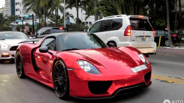 بالصور سيارة بورش 918 سبايدر السعودية بالكروم الأحمر في مدينة أمريكية