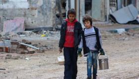 أكثر من ثمانية آلاف مدني محاصرون في بلدة داريا مع تواصل القصف