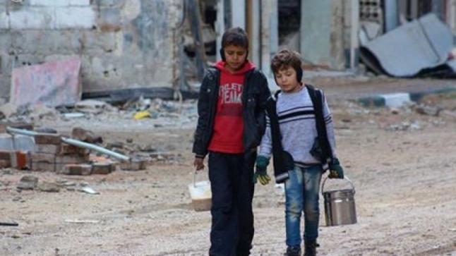 أكثر من ثمانية آلاف مدني محاصرون في بلدة داريا مع تواصل القصف