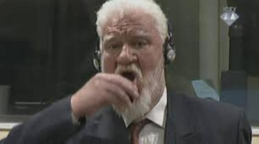 وفاة سلوبودان برالياك بعد شربه للسم في قاعة المحكمة بلاهاي